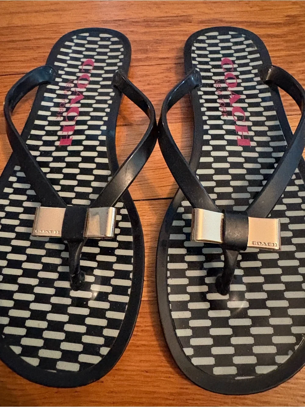 Coach Black Jelly Flip Flops with Gold Bow and Patterned Footbed sz 6